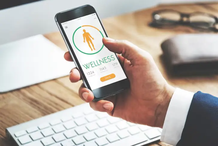 A professional using a wellness app